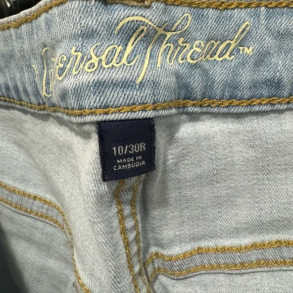 distressed blue jeans - Picture 7 of 8